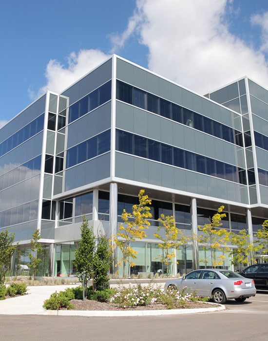 Modern Office Building Exterior Electrician Inspecting in Edmonton, AB